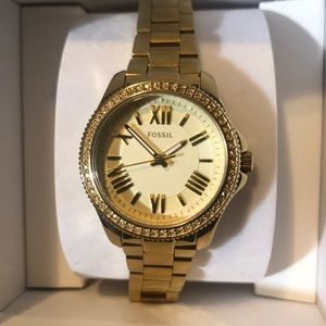 Gold fossil watch